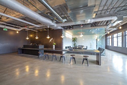 Warmly lit modern office interior set up for a corporate video production shoot in Tampa